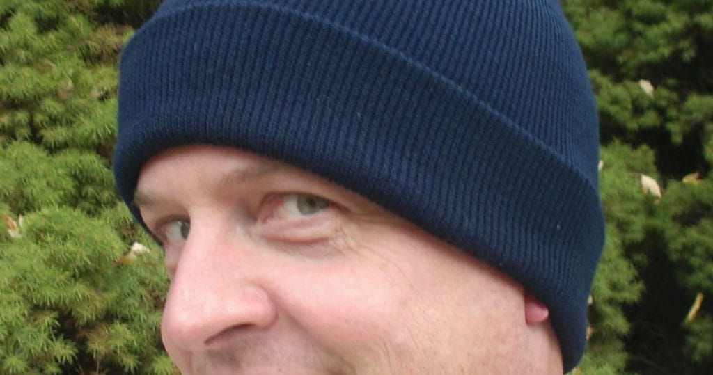 Doug Vos wearing a blue beanie.