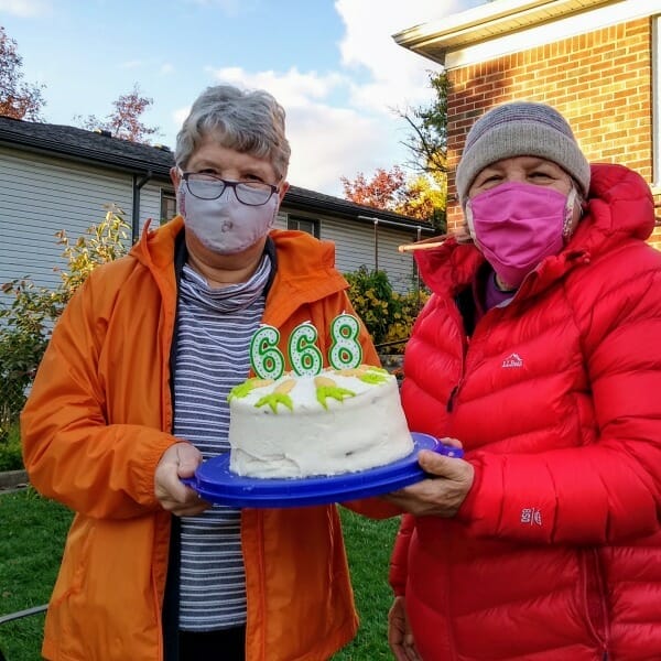 2020 covid19 style birthday celebration. Jane's two sisters are wearing face masks.