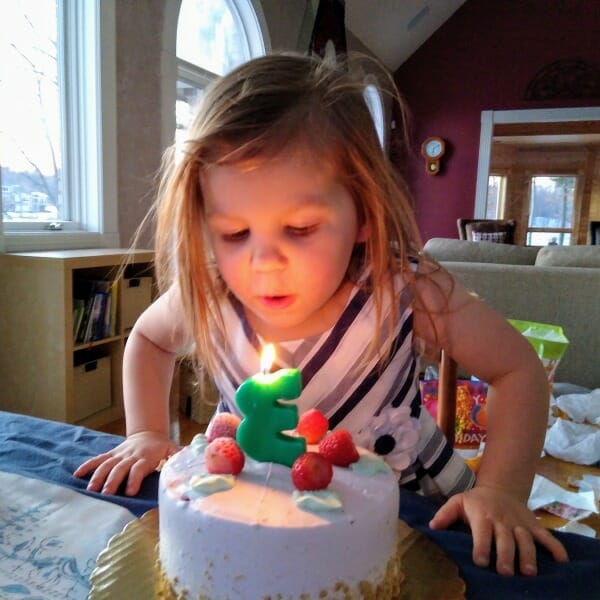 My grand-daughter Haddie. Blowing out the candle - celebrating her 3rd birthday.