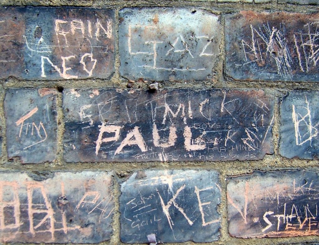 Names and words scratched on the surface of bricks. Millions of free images are available.