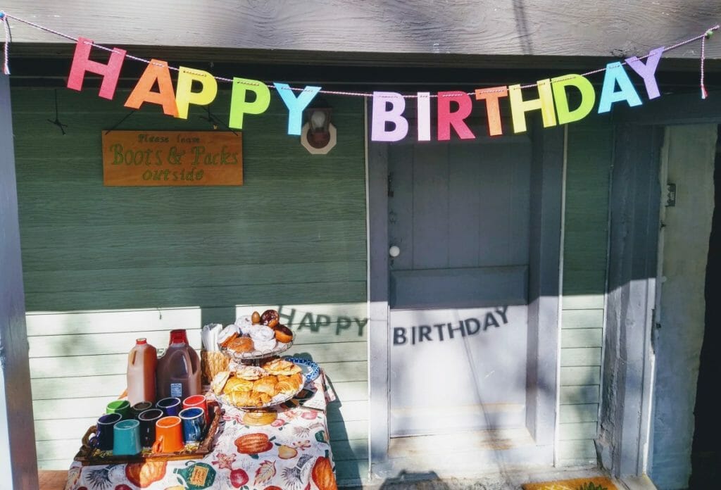 Happy Birthday sign hanging up for the celebration of Maple's 2nd birthday.