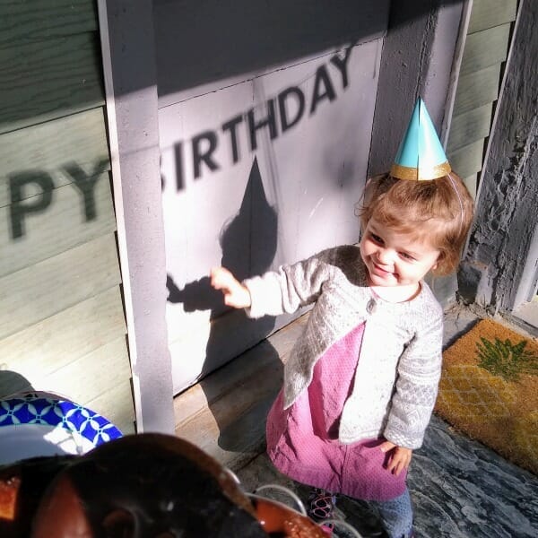 My grand-daughter Maple - wearing a pointy party hat on her birthday. Celebrating her 2nd birthday - in Unionville, New York.
