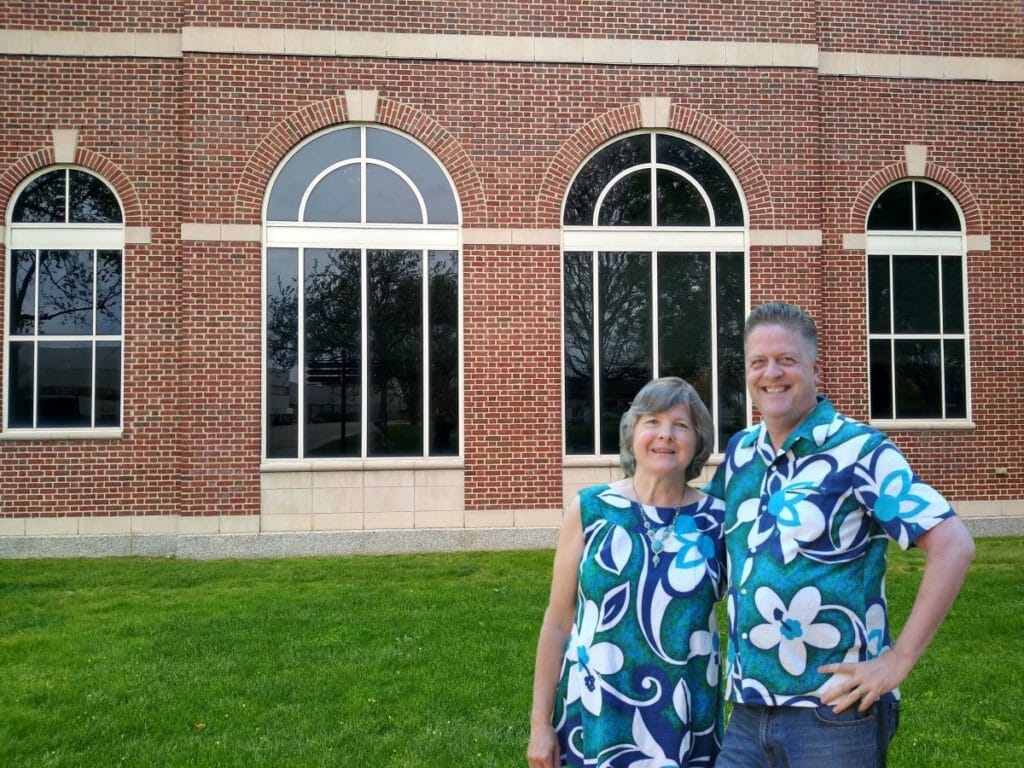 Jane and Doug Vos near the new, front entrance to the Henry Ford Museum in Dearborn, Michigan.