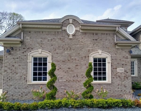 Decorative keystone motif above windows on the garage of this home on Morley Street in Dearborn, Michigan.