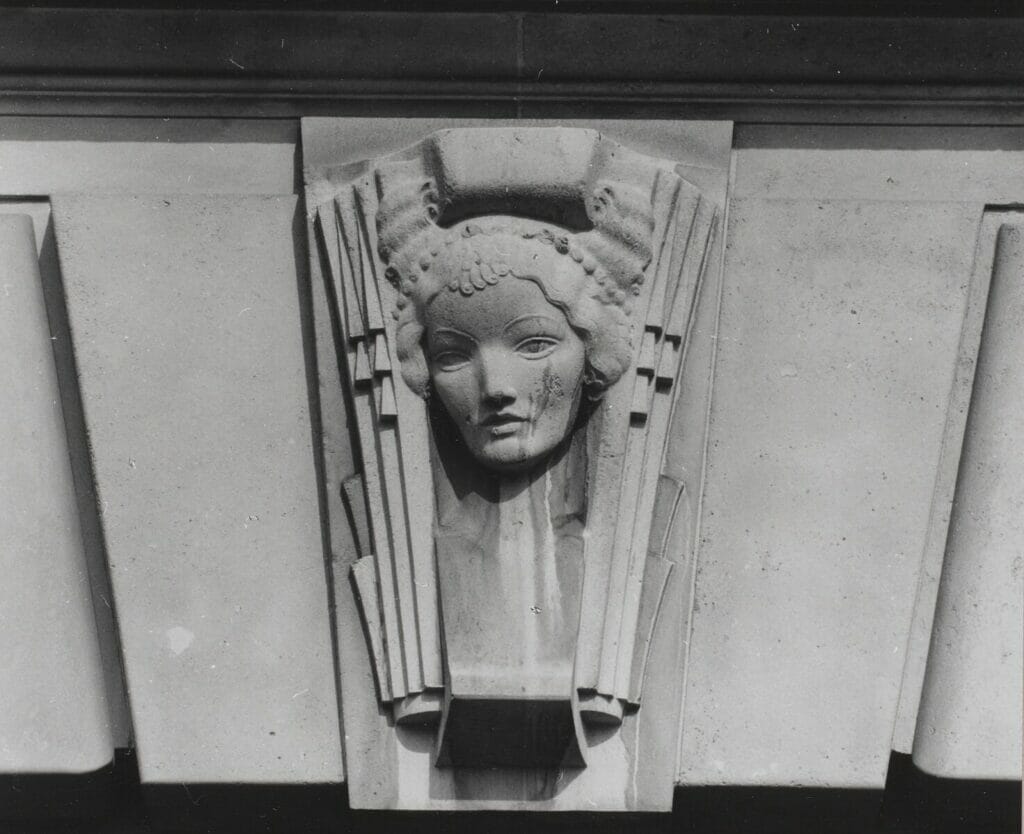 A keystone depicting a woman's head, as found at the Unilever House, New Bridge Street, London, UK.